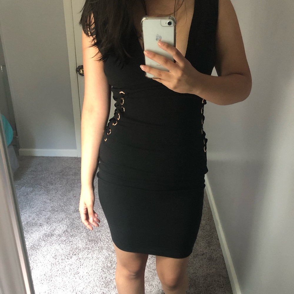 Black dress with gold rings